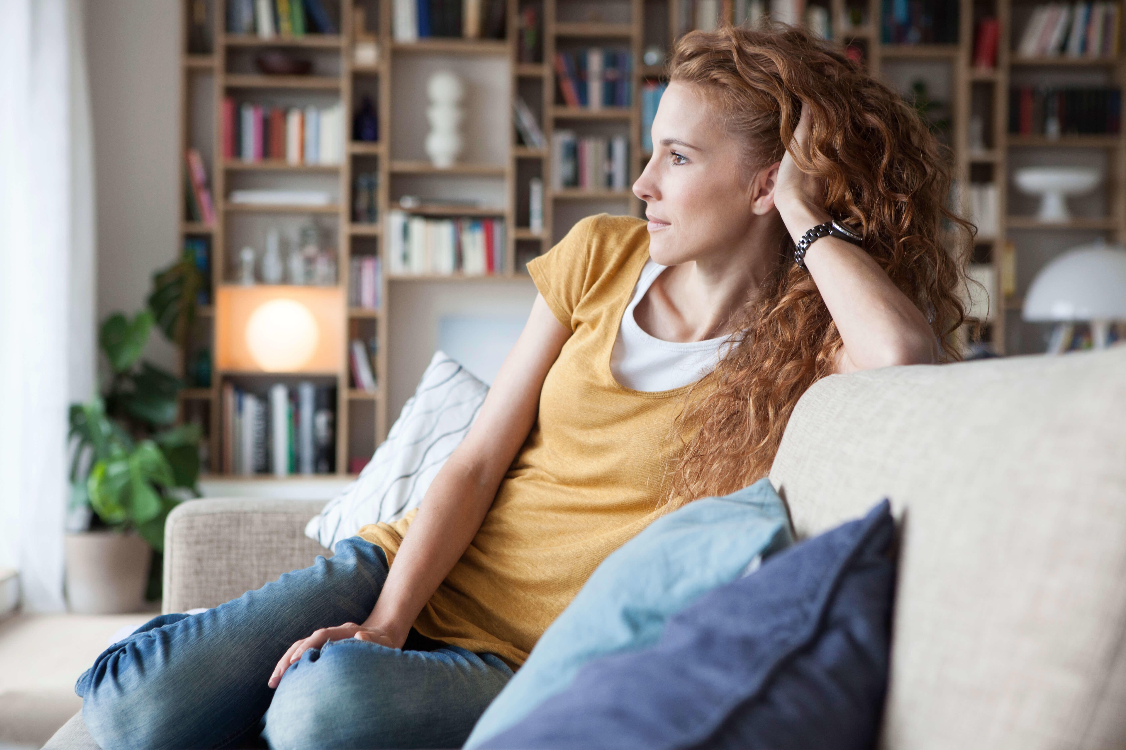 woman_sitting_on_sofa